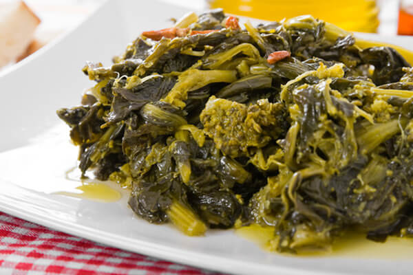 southern mixed greens on a white plate